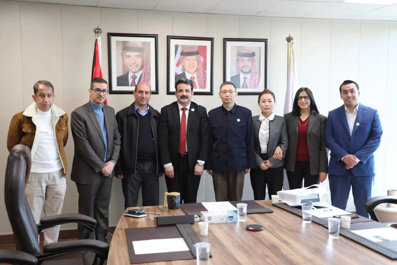 The visiting delegation and Jordanian counterparts at the ministry meeting.