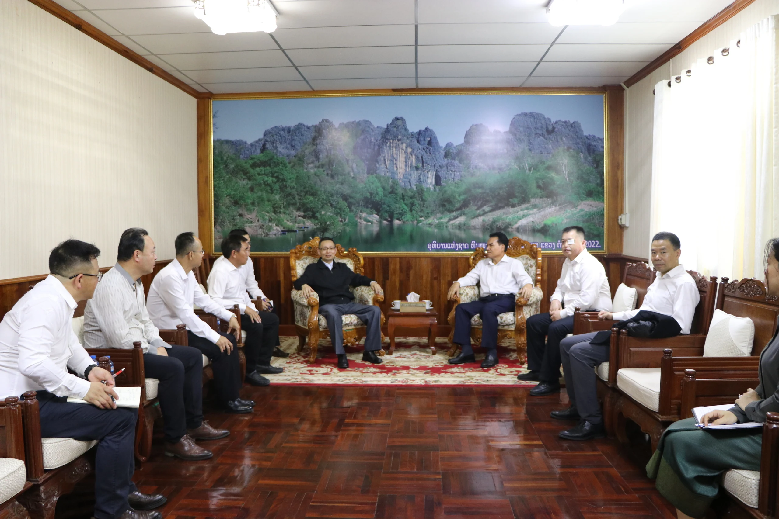 The delegation and ministry counterparts in discussion.