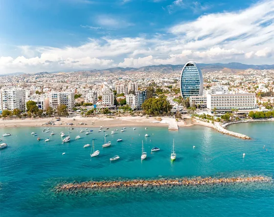 A Cyprus coastal-city illustration accompanying the delegation report.