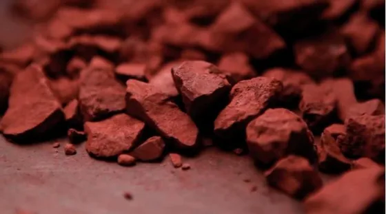 A close-up of reddish material used to illustrate the source article’s commercial discussion.