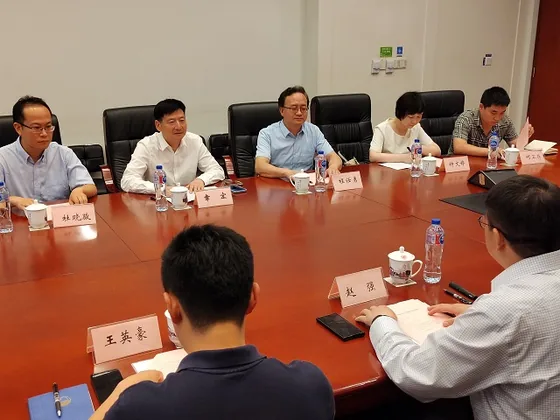 University representatives in discussion with the visiting delegation.