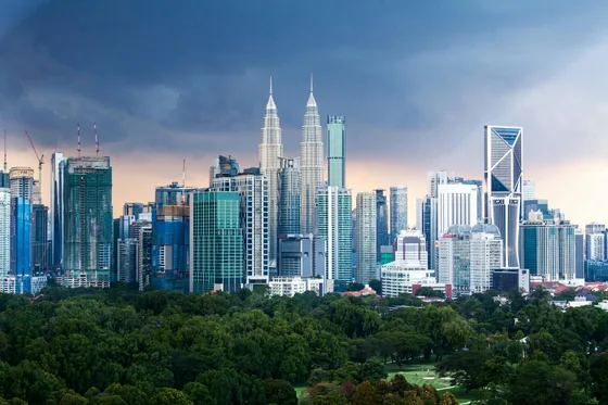Kuala Lumpur skyline accompanying the working-conference report.