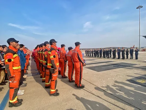 Rescue personnel assemble outdoors during the Myanmar earthquake response.