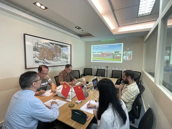 Participants working around a conference table during the China–Brazil biotechnology discussion.