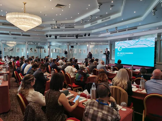 The conference audience in Limassol during an international contribution.