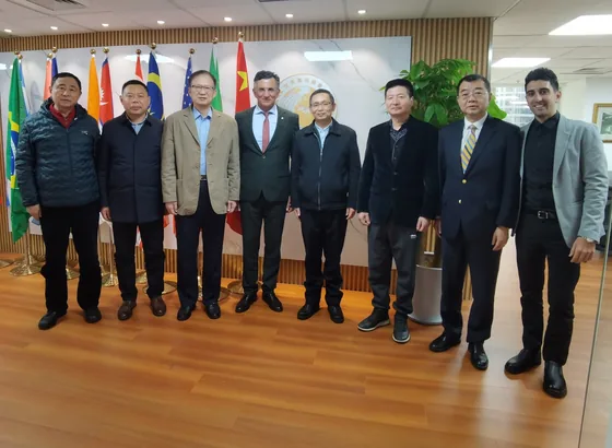 Delegates gathered after the Shanghai forum-planning meeting.