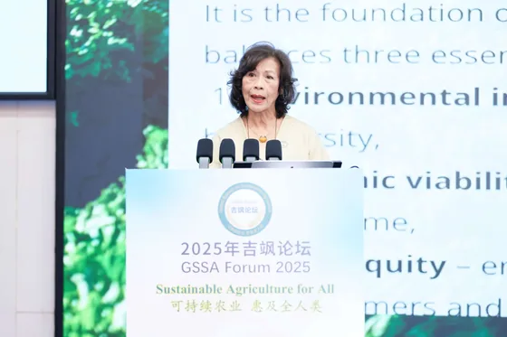 A keynote speaker addresses the forum from the lectern.