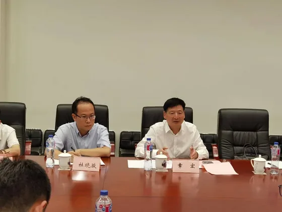 Participants listening during the Fudan meeting.