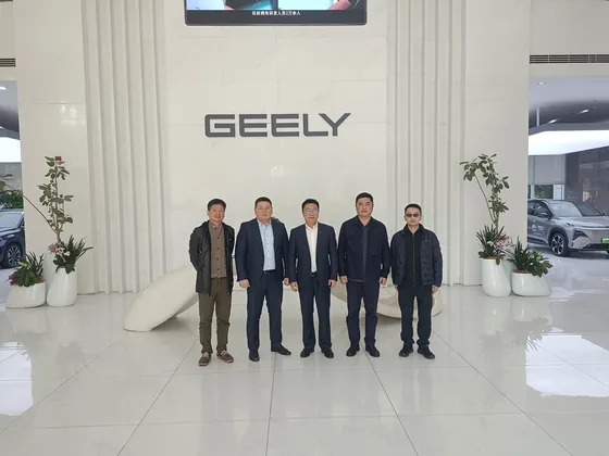 Delegation photograph during the Geely enterprise visit.